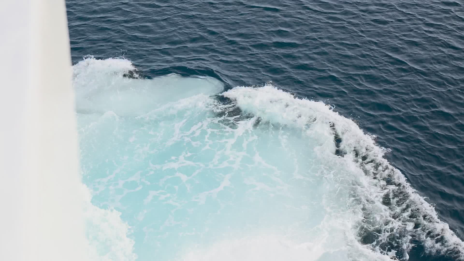 Film still: the ship’s wake on Arctic water